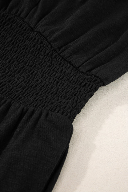 Combinaison noire froncée taille haute sans manches à col en V