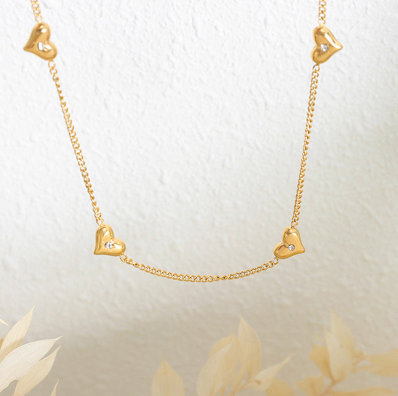Ensemble de boucles d'oreilles et bracelet en or 18 carats, design classique en forme de cœur incrusté de zircon