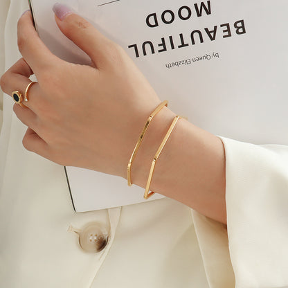 18K gold trendy simple polygonal line hollow double-layer design light luxury style bracelet