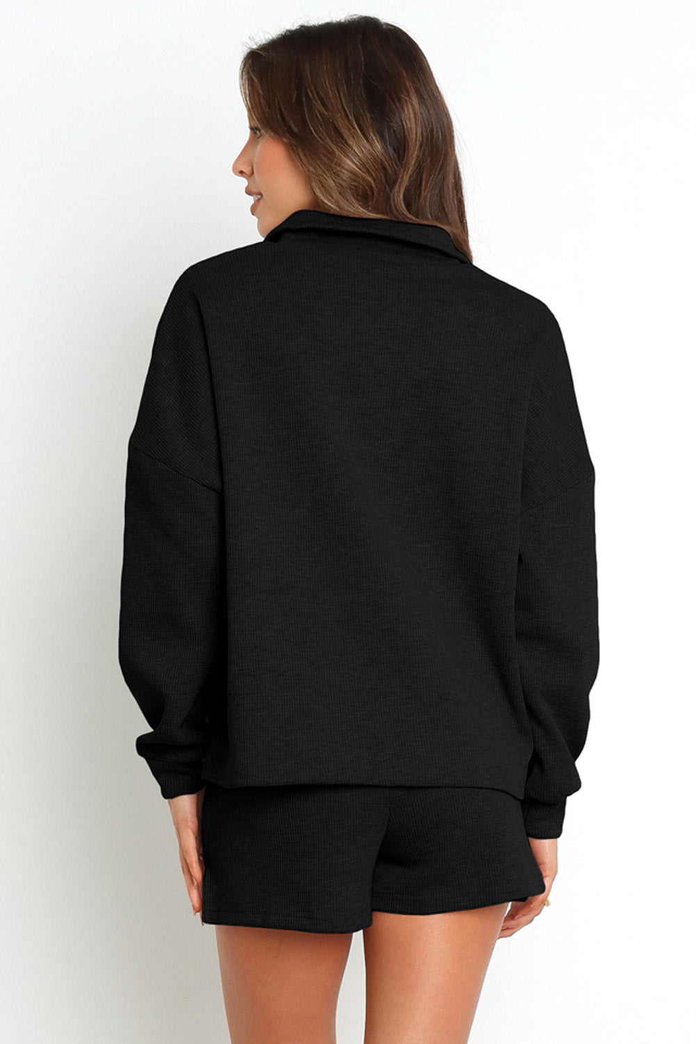 Ensemble sweat-shirt zippé côtelé noir et short taille haute