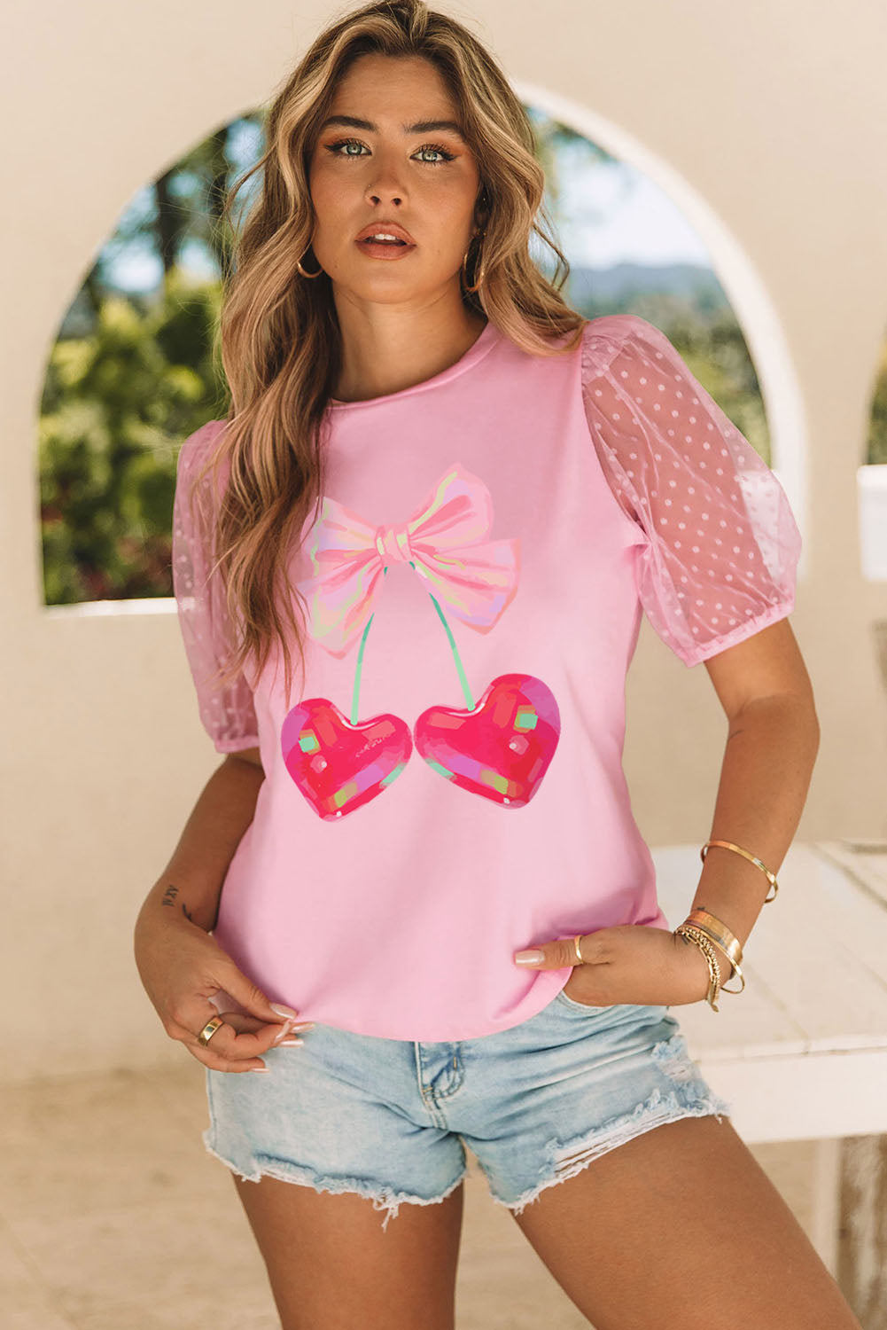 T-shirt à manches en maille à pois avec motif cerise en forme de cœur et nœud rose