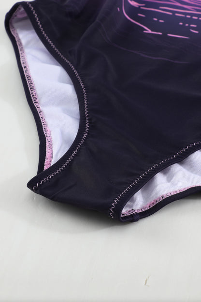 Maillot de bain une pièce noir à imprimé tie-dye et dos croisé