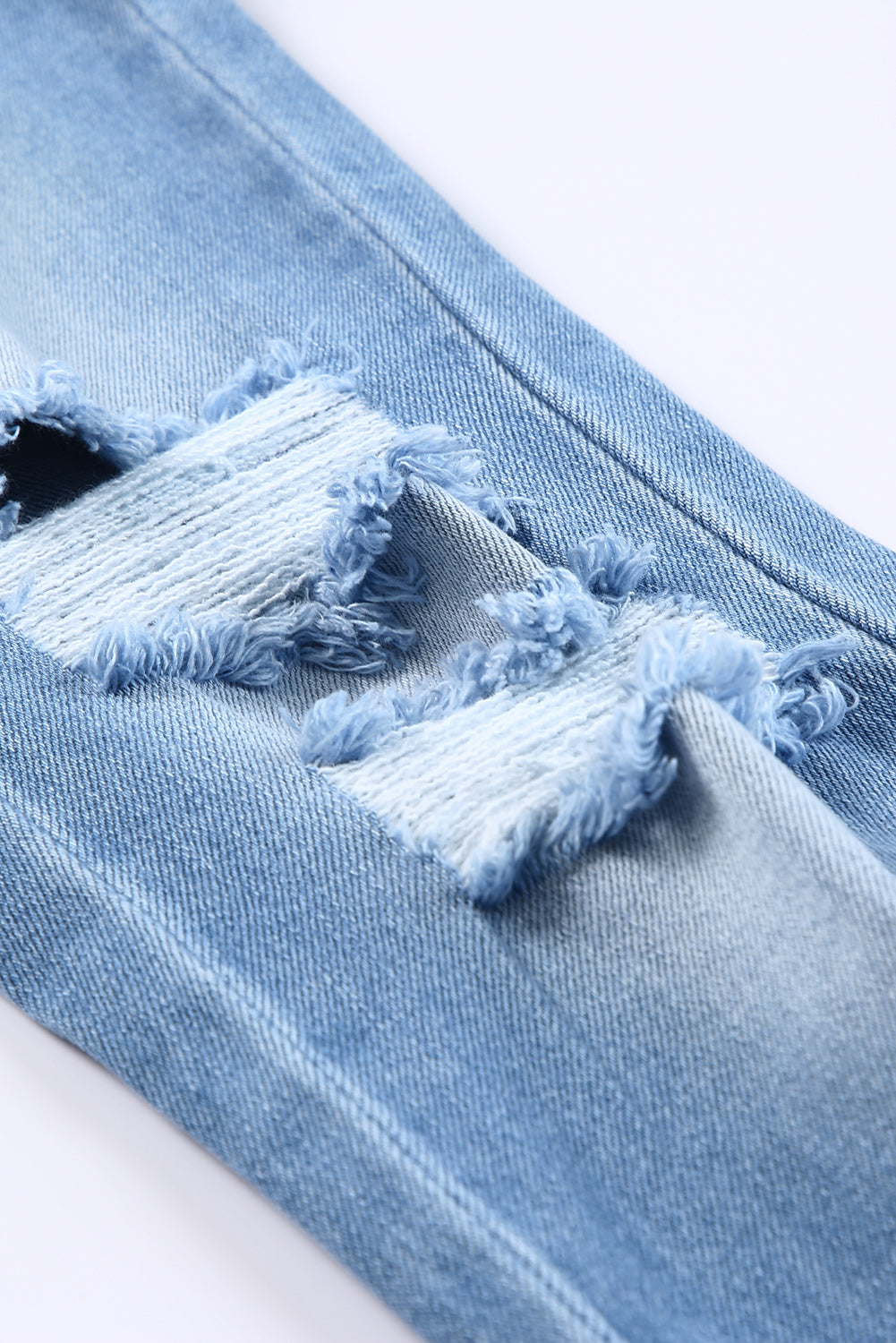 Himmelblaue, seitliche Schlitze, zerrissene Jeans mit geradem Bein und hoher Taille