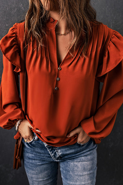 Blouse orange plissée à volants et boutonnée à col en V