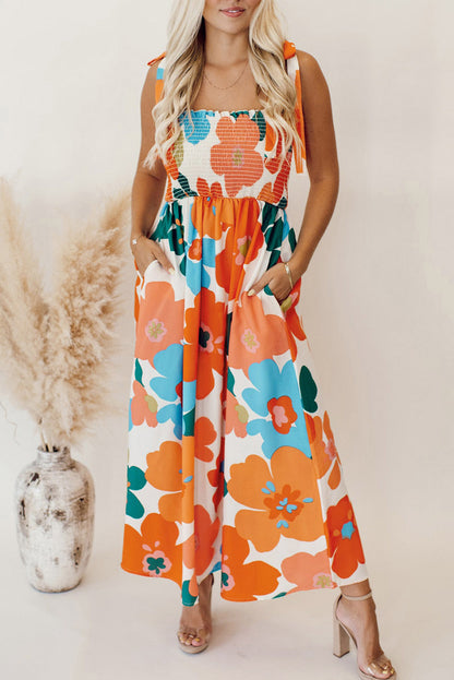 Robe longue smockée orange à imprimé floral et lien sur les épaules