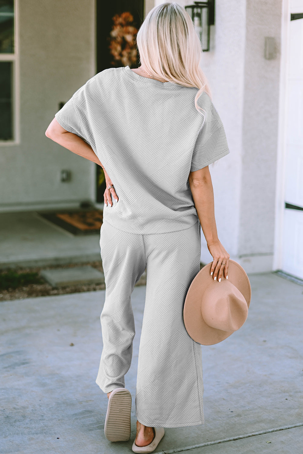 Set aus strukturiertem, locker sitzendem T-Shirt und Hosen mit Kordelzug in Erdbeerrosa