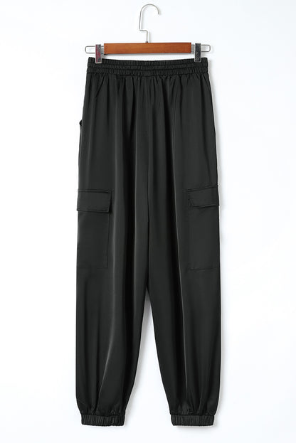 Pantalon noir en satin avec poches et cordon de serrage à taille élastique