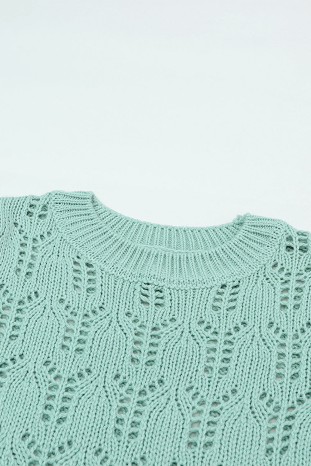 Pull en pointelle tricoté transparent vert