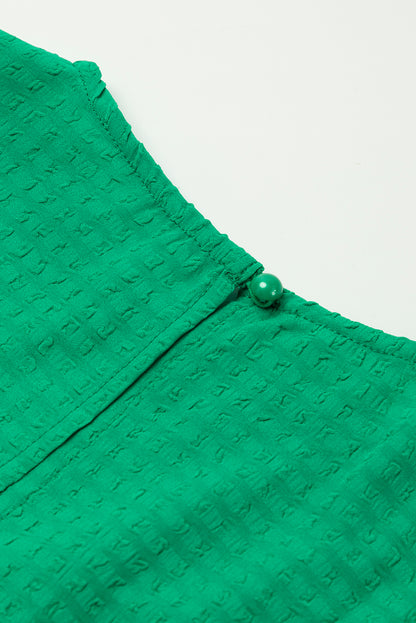 Mini-robe de couleur unie à col rond et manches bouffantes vert foncé