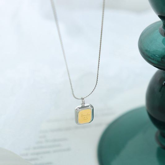 Trendy simple geometric square necklace with smiling face design and versatile necklace