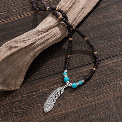 Collier pendentif en perles de bois mosaïque et turquoise avec plumes, exquis et tendance