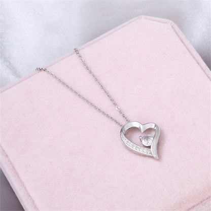 Collier de boîte-cadeau de conception de Zircon incrusté de coeur de pêche ajouré de mode pour la petite-fille bien-aimée