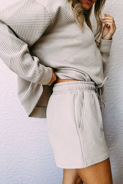 Ensemble haut texturé blanc à manches longues et short à cordon de serrage