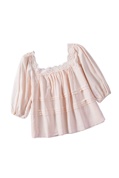 Blouse babydoll beige à manches bouffantes et œillets