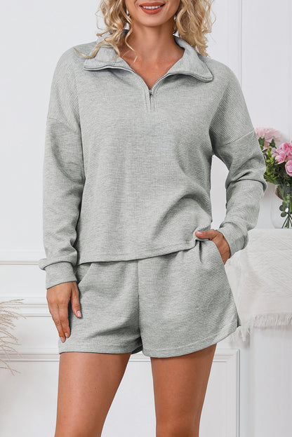 Ensemble sweat-shirt zippé côtelé noir et short taille haute