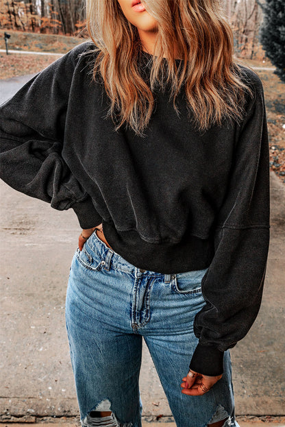 Sweat-shirt noir en forme de V à dos ouvert et délavé à l'acide