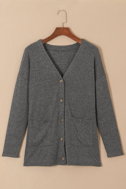 Cardigan boutonné sur le devant avec poches en tricot gris chiné