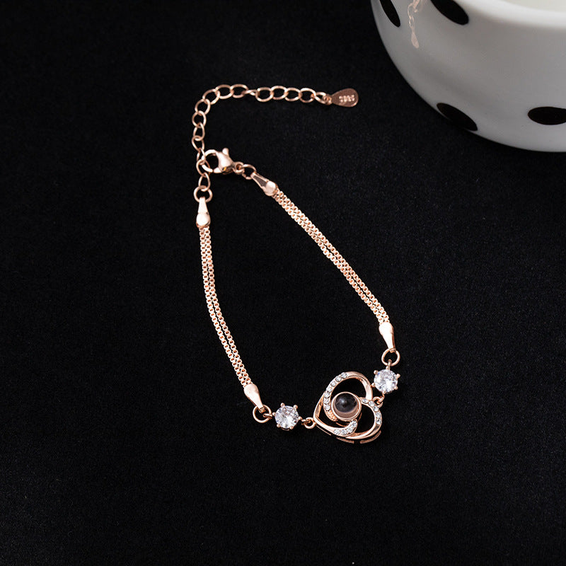 Luxurious and elegant rotating heart-shaped diamond projection bracelet