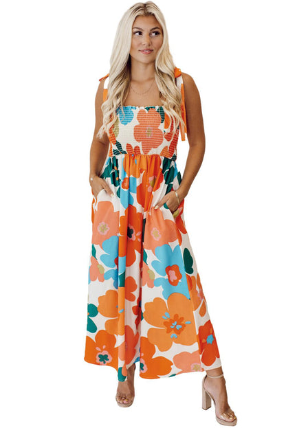 Robe longue smockée orange à imprimé floral et lien sur les épaules