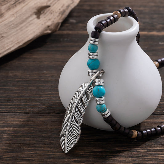 Collier pendentif en perles de bois mosaïque et turquoise avec plumes, exquis et tendance