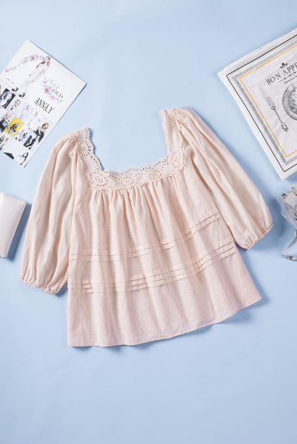 Blouse babydoll beige à manches bouffantes et œillets