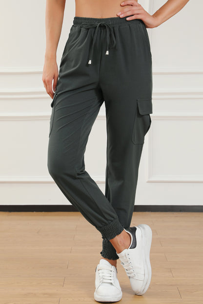 Pantalon de jogging taille haute gris avec poches latérales et cordon de serrage