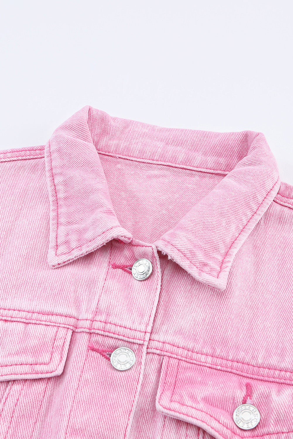 Veste en jean boutonnée rose clair avec poches à rabat