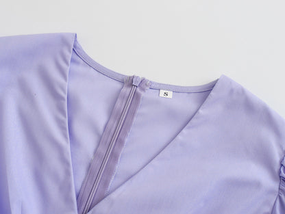 Robe violette à la taille avec nœud sur la poitrine pour les vacances du début du printemps