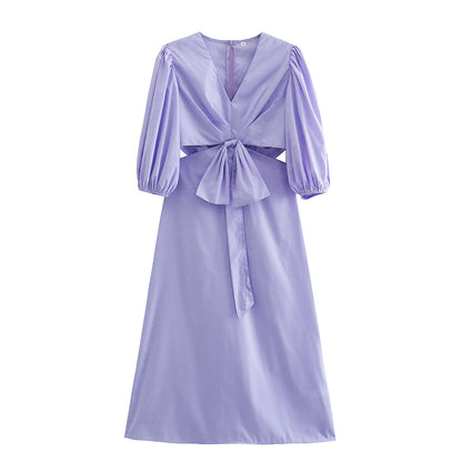 Robe violette à la taille avec nœud sur la poitrine pour les vacances du début du printemps