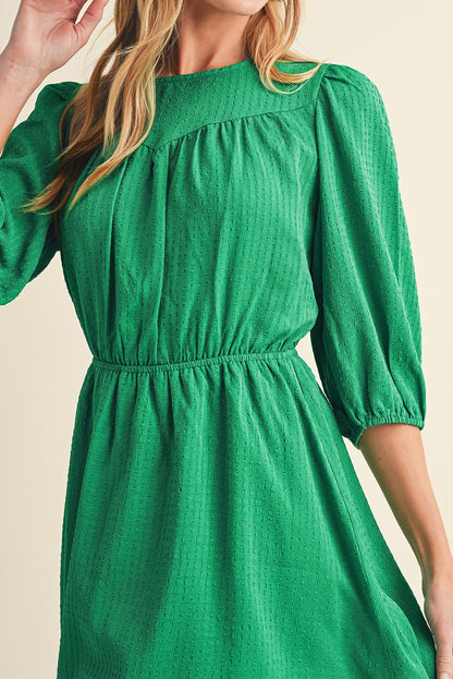 Mini-robe de couleur unie à col rond et manches bouffantes vert foncé