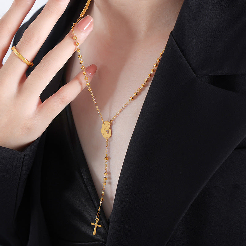 18K gold fashionable woman portrait with cross tassel design versatile necklace