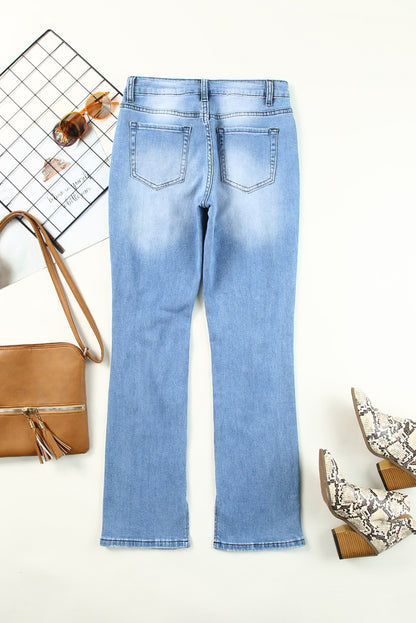 Himmelblaue, seitliche Schlitze, zerrissene Jeans mit geradem Bein und hoher Taille