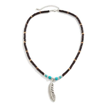 Collier pendentif en perles de bois mosaïque et turquoise avec plumes, exquis et tendance