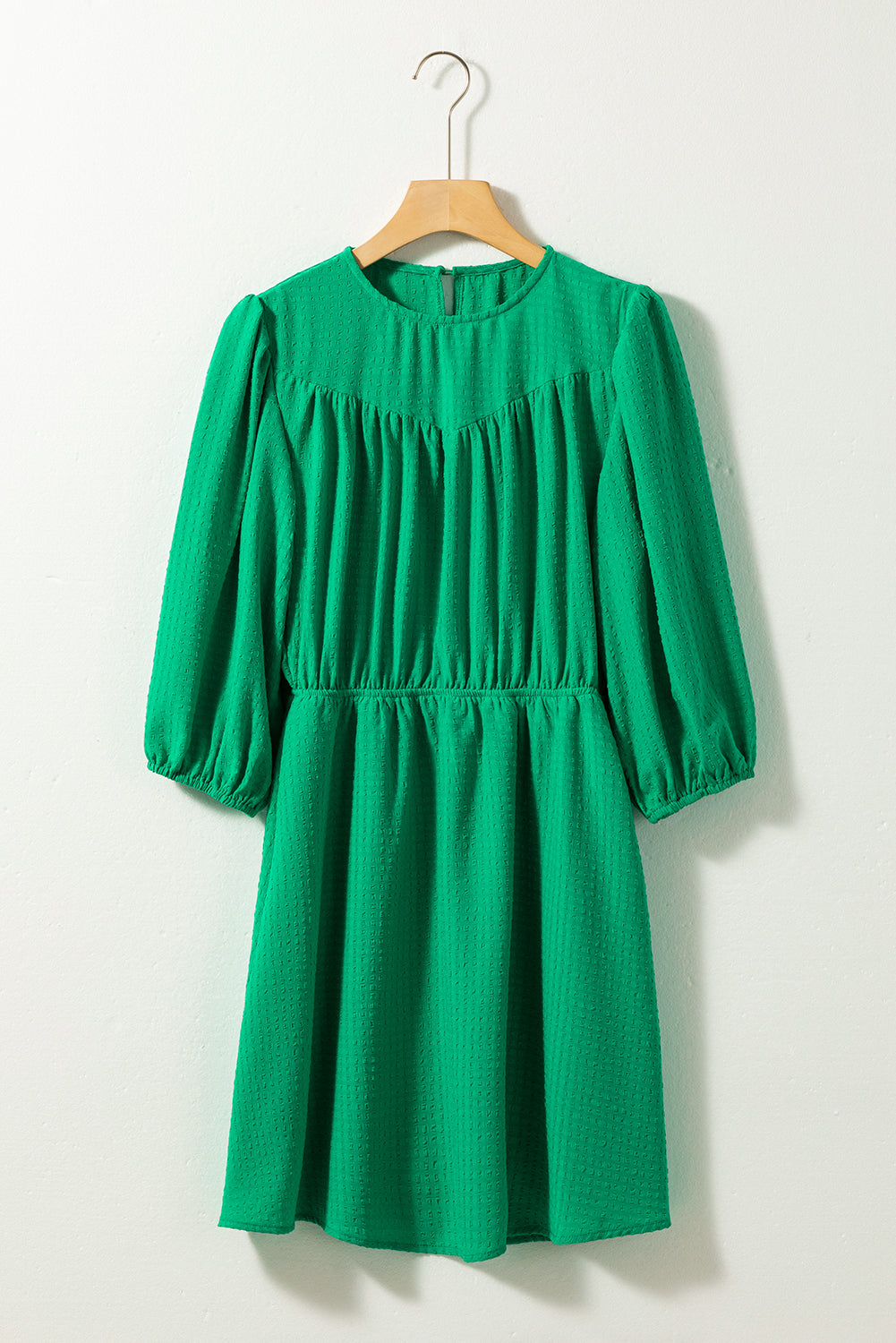 Mini-robe de couleur unie à col rond et manches bouffantes vert foncé