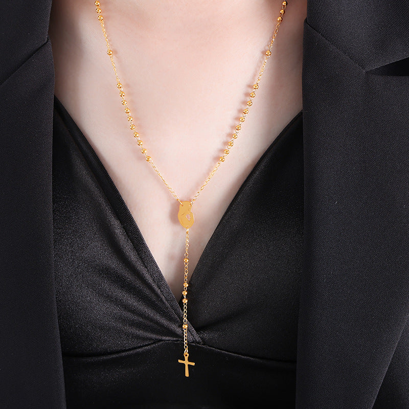 18K gold fashionable woman portrait with cross tassel design versatile necklace