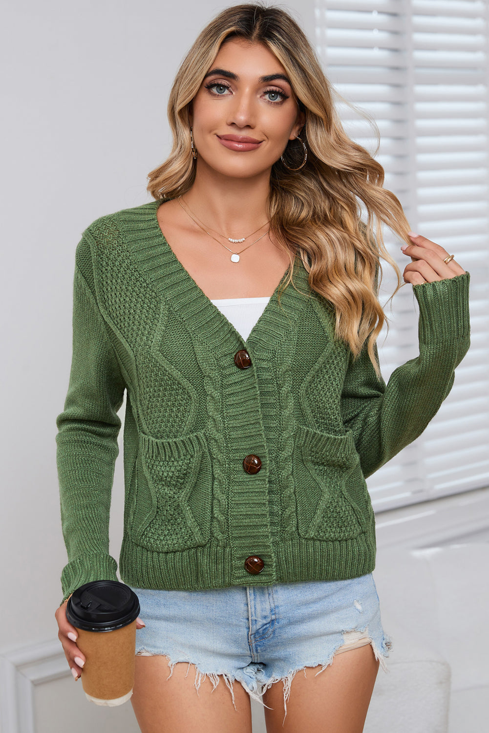 Cardigan pull court texturé avec poches et boutons vert