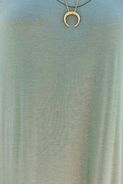 Robe longue fendue à col en V et couleur unie vert herbe