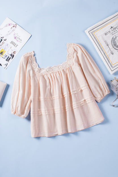 Blouse babydoll beige à manches bouffantes et œillets