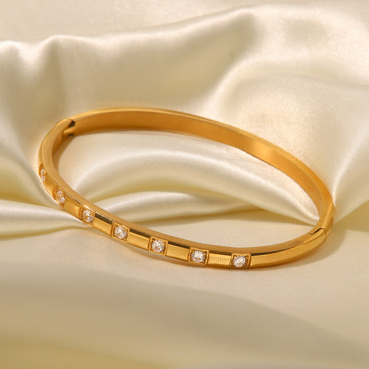 Klassisches, schlichtes, vielseitiges Armband aus 18-karätigem Gold mit eingelegtem, weißem, rundem Zirkon