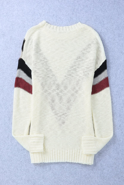 Pull noir à épaules tombantes et rayures à chevrons