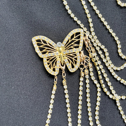 Robe une pièce à bandage en filet avec chaîne en diamant et papillon doré