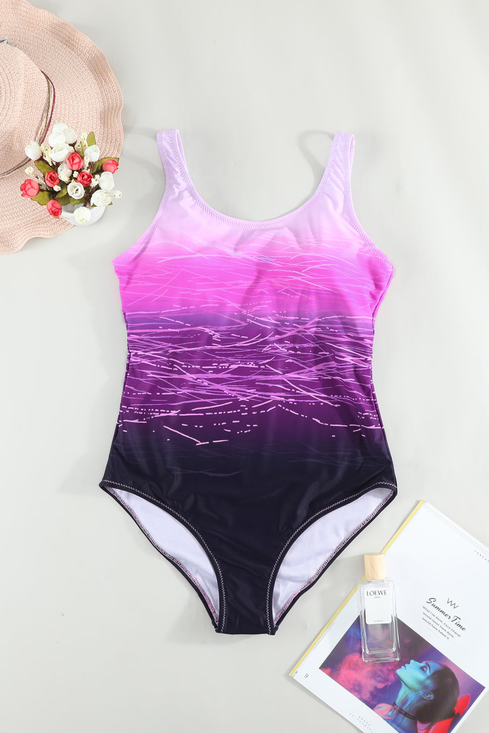 Maillot de bain une pièce noir à imprimé tie-dye et dos croisé