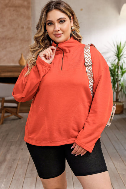 Orangefarbenes Sweatshirt mit O-Ring-Reißverschluss und Taschen in Übergröße