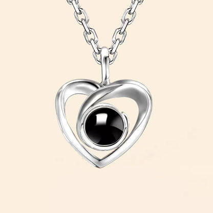 Fashion simple hollow heart projection necklace