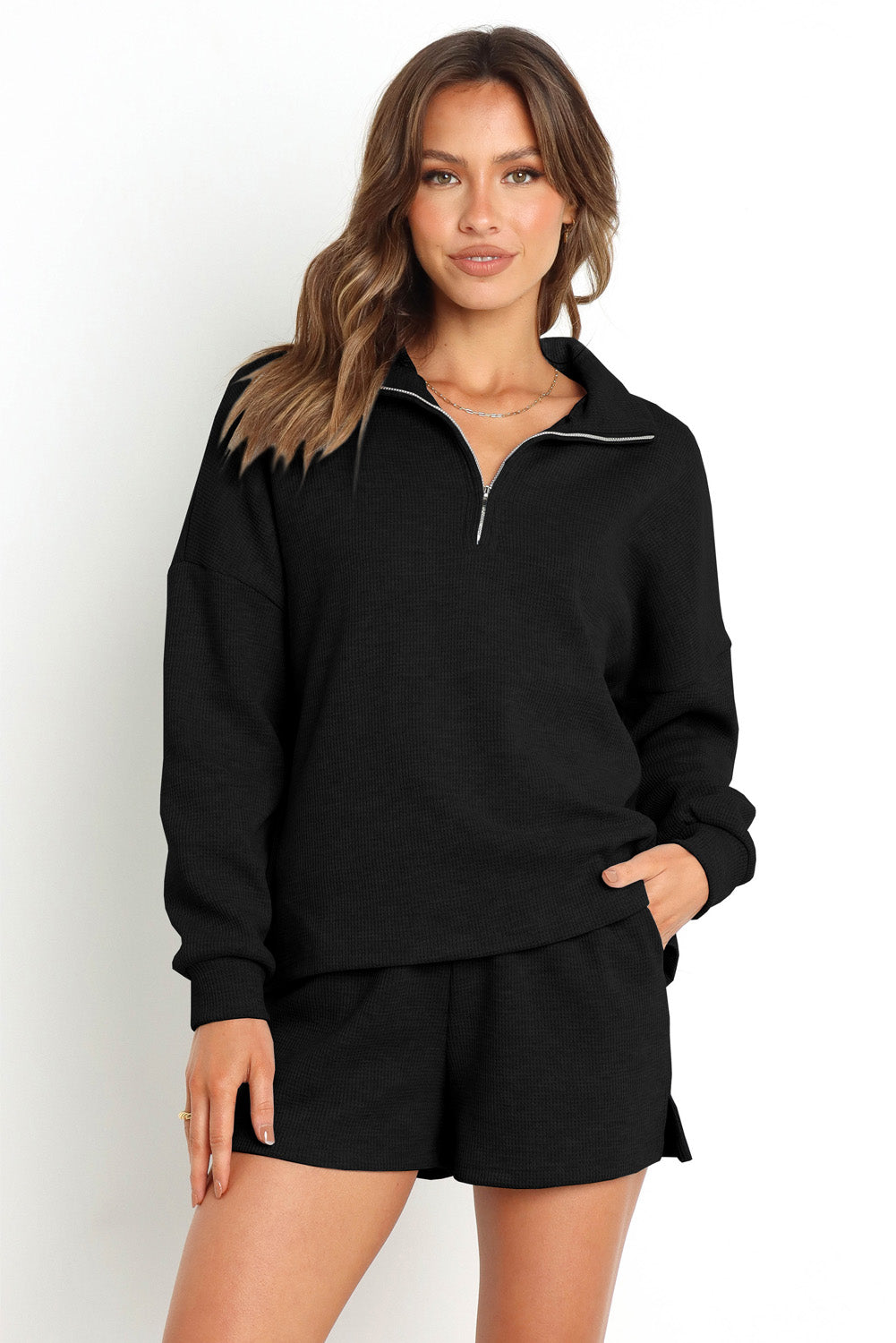 Ensemble sweat-shirt zippé côtelé noir et short taille haute