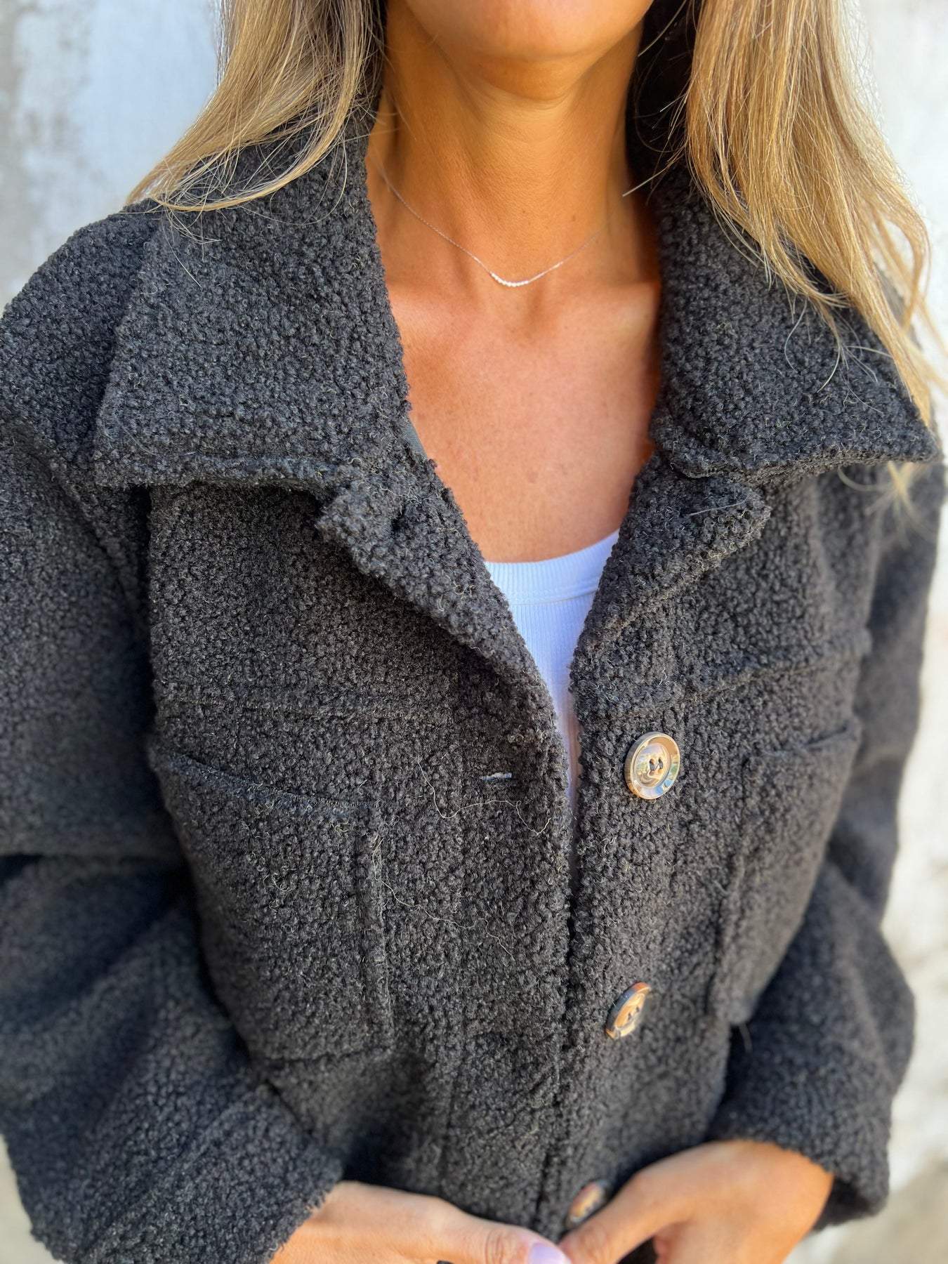 Manteau en laine d'agneau à revers simple boutonnage pour femme