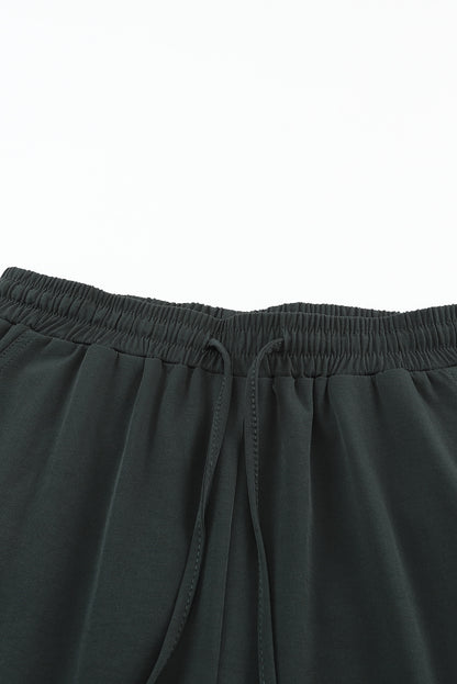 Pantalon de jogging taille haute gris avec poches latérales et cordon de serrage