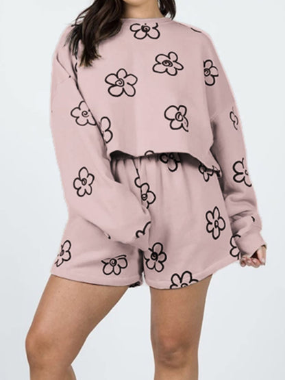 Ensemble sweat-shirt et short fleuri à épaules tombantes