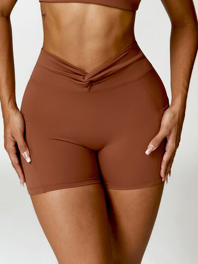 Twisted High Waist Active Shorts with Pockets