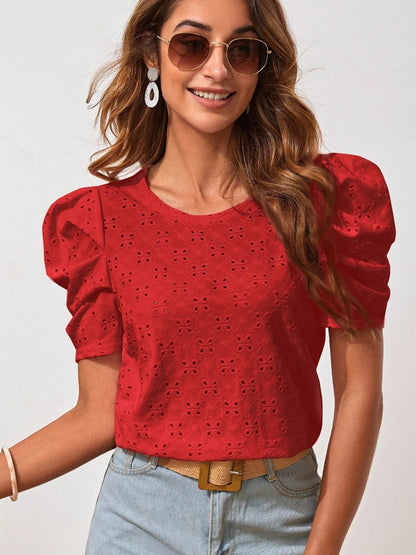 Blouse à œillets et col rond à manches bouffantes